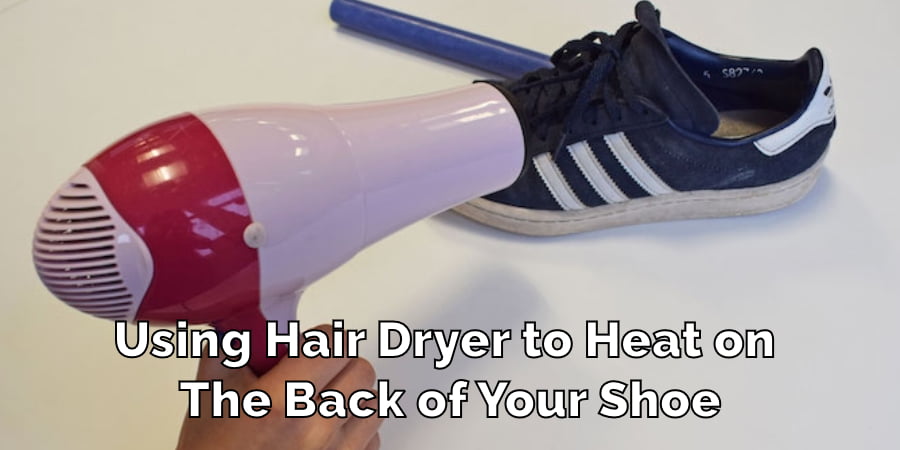 Using Hair Dryer to Heat on The Back of Your Shoe