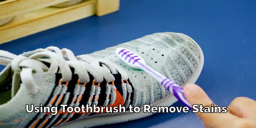 Using Toothbrush to Remove Stains