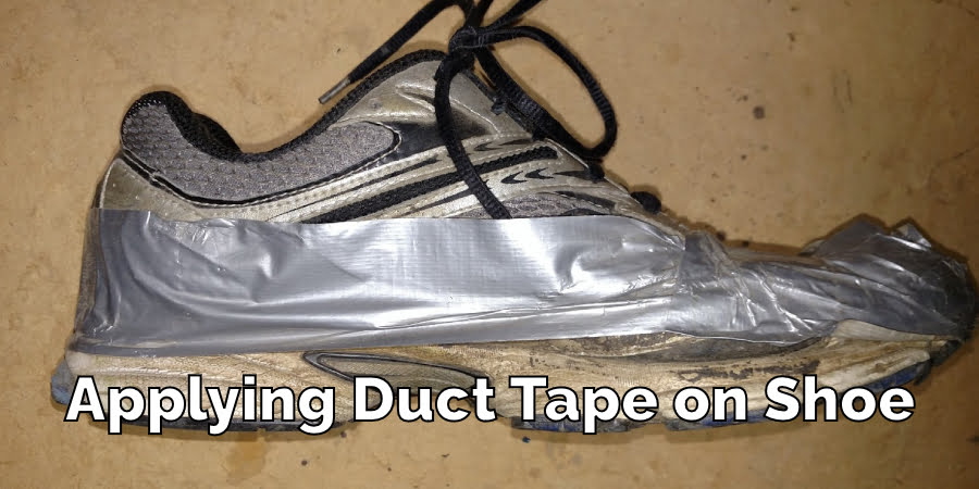 Applying Duct Tape on Shoe