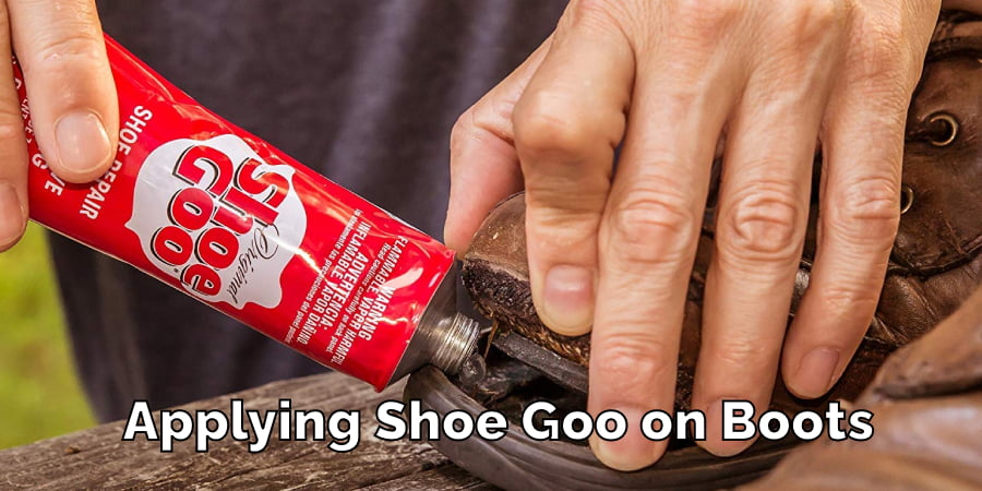 Applying Shoe Goo on Boots