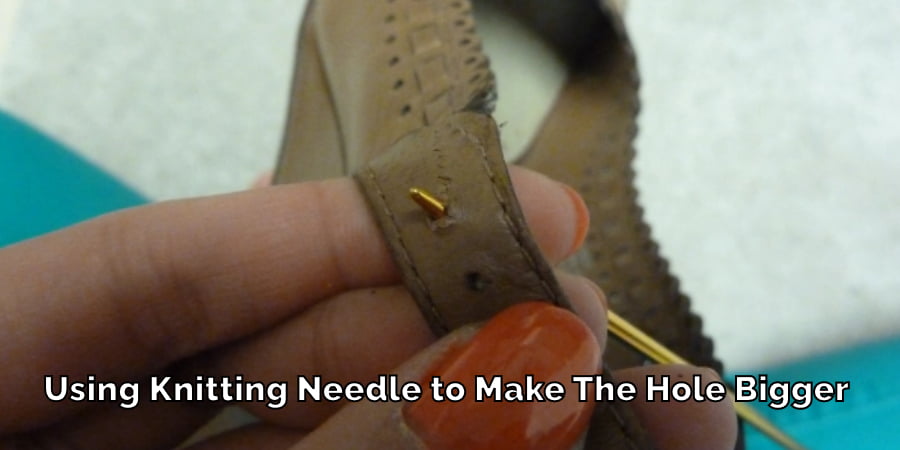 Using Knitting Needle to Make The Hole Bigger